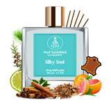 Oud Andarbia Silky Soul luxury parfum bottle with ingredients on a white background